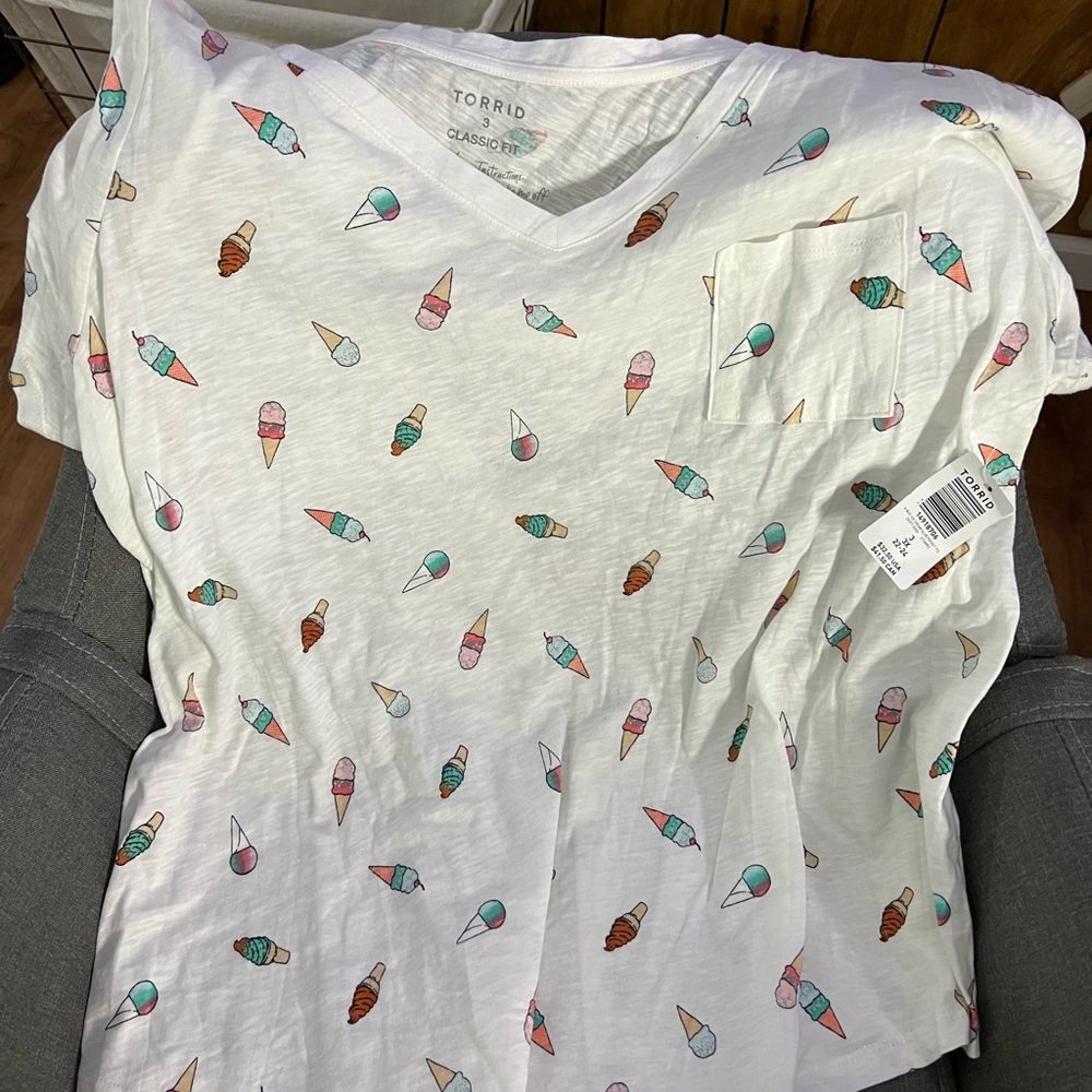 New with tags TORRID ice cream v neck pocket tee. Size 3